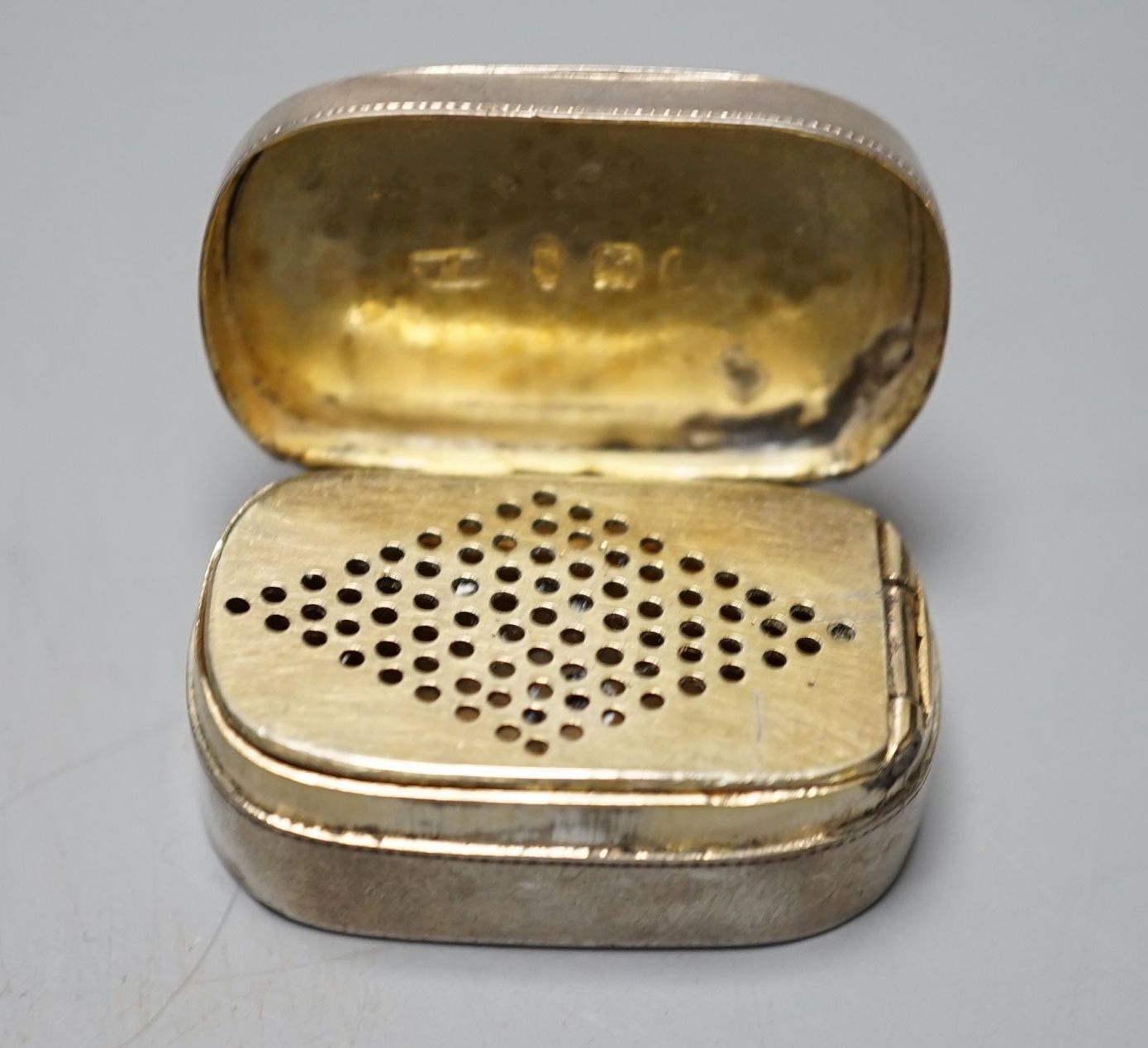 A George III engraved silver oval vinaigrette, Thomas Harper?, London, 1798, 35mm.